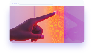 computer monitor with hand pointing at screen